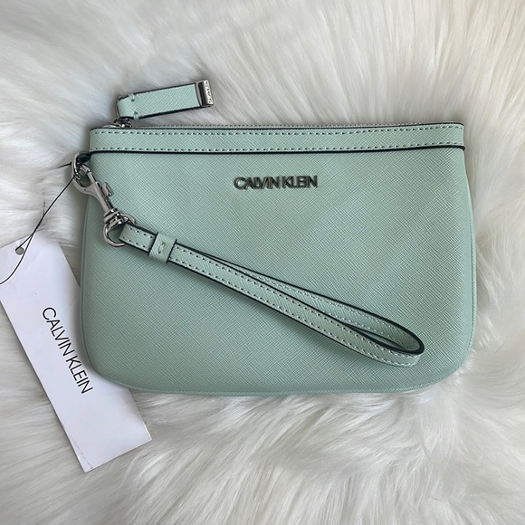 Calvin Klein Handbags - Calvin Klein Wristlet Wallet New With Tag 🏷️